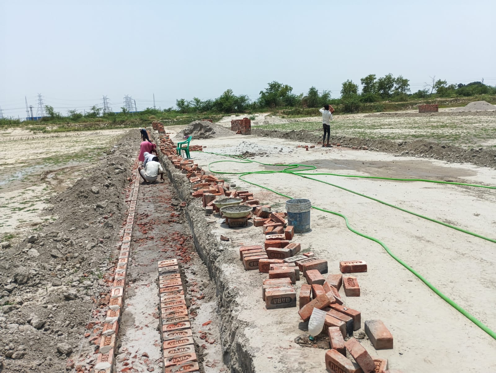 Brick laying construction Vigyan Path residential plots Lucknow