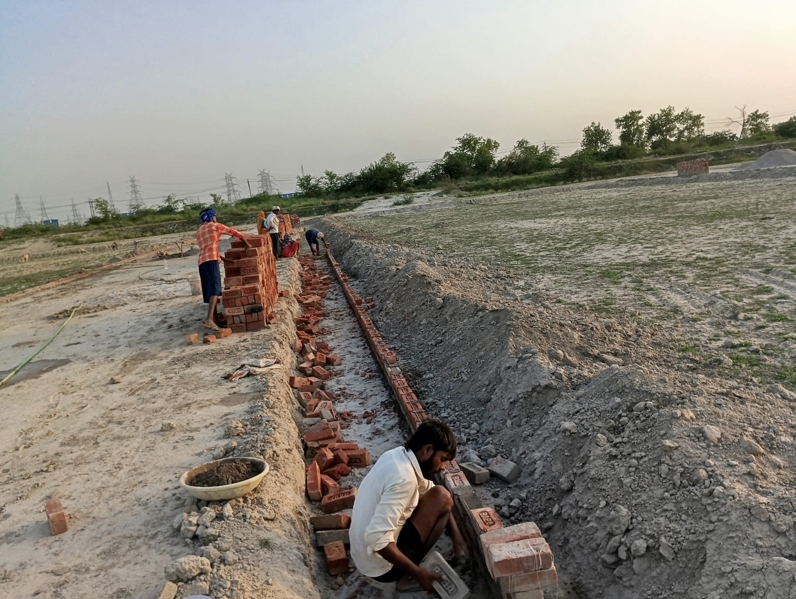 Brick foundation line Vigyan Path residential plots Lucknow